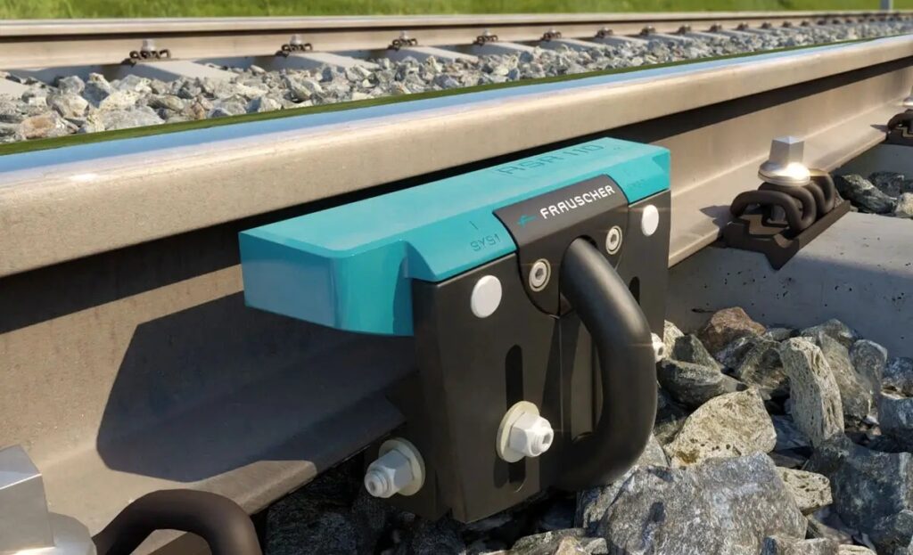 Frauscher RSR110 inductive axle counter sensor installed on rail